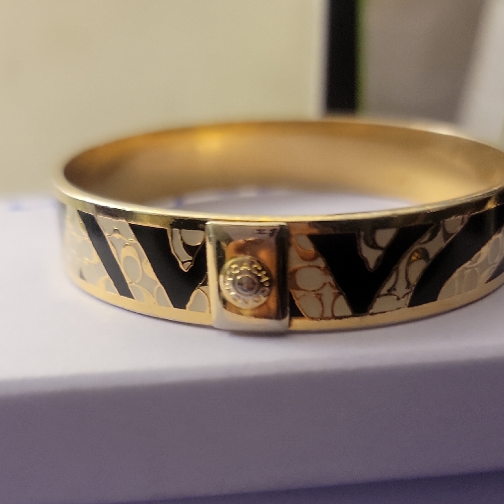 Coach Elegant Gold and Black Bangle Bracelet